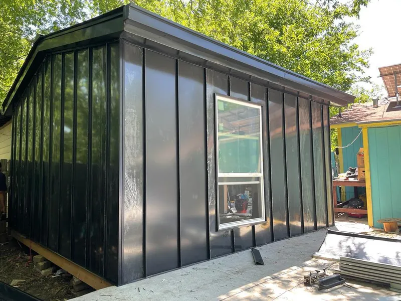 Black standing seam metal wall panels for Roof Inspection in Birmingham